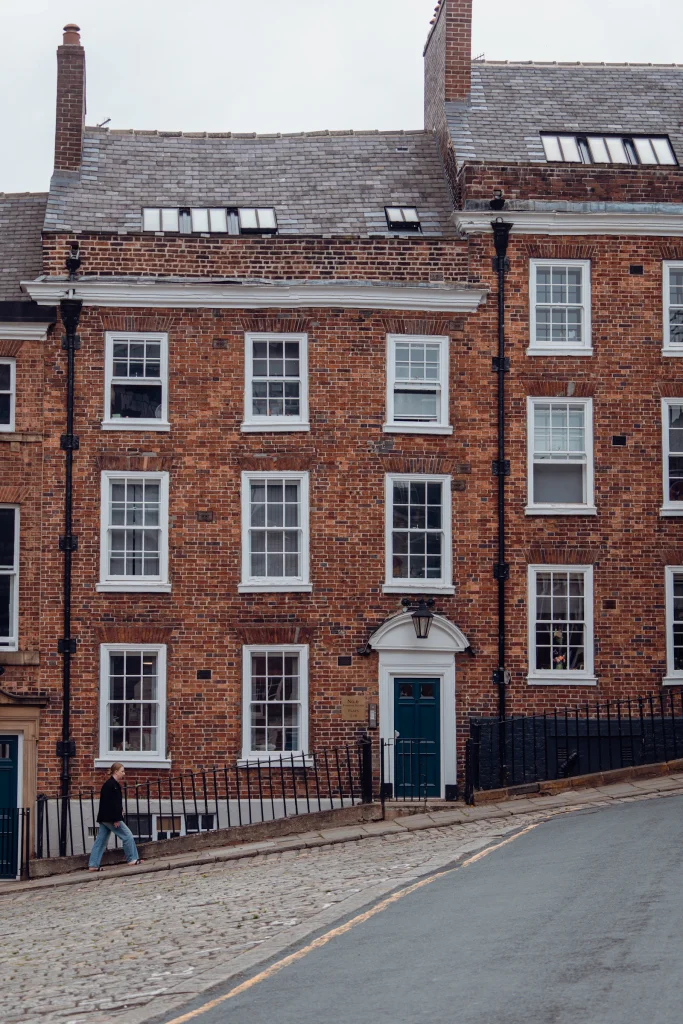 Georgian brick house front with sash windows