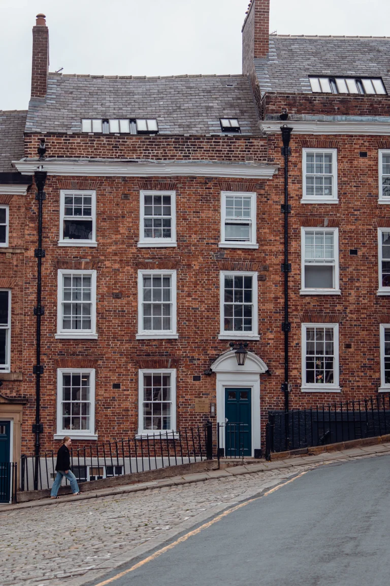 Georgian brick house front with sash windows